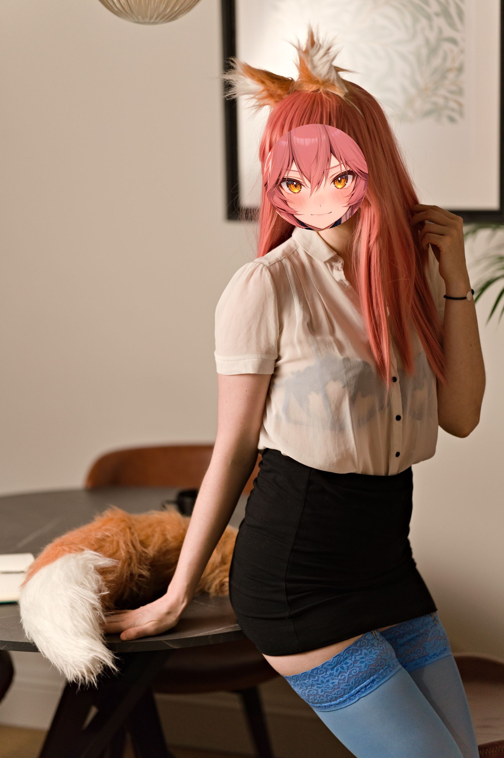 Shizuka Kawa cosplaying as Tamamo no Mae from Fate dressed in a sheer white shirt, black miniskirt, and blue lingerie with blue stockings. She leans against a table resting her fox tail and her hand atop the surface. Her bra is visible through the sheer fabric of her shirt.