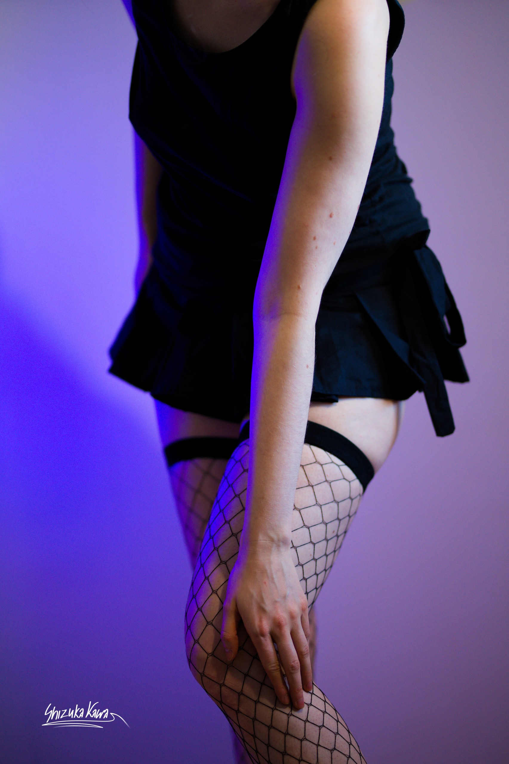 Sporty Tanktop and Pleated Miniskirt with Fishnet Stockings image 10