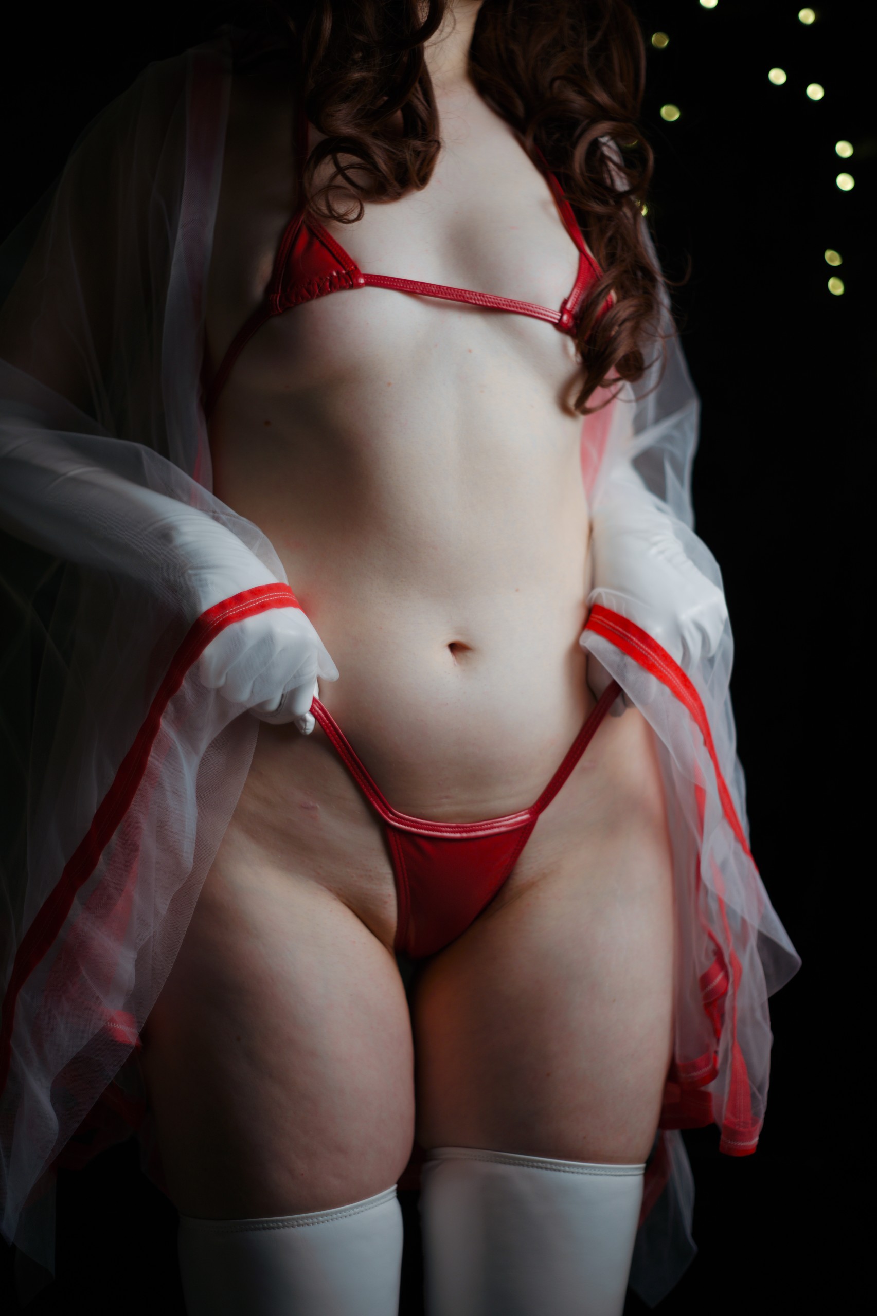 Miko Priestess in See-through Kimono and Red Latex Micro Bikini image 1